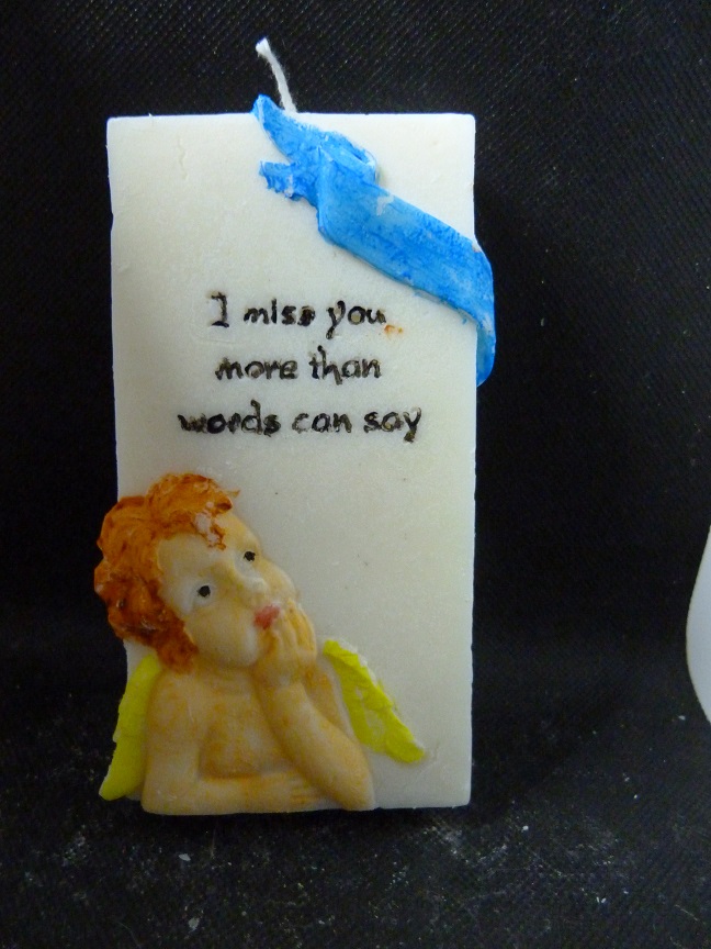(image for) memorial tekst met engel kaars